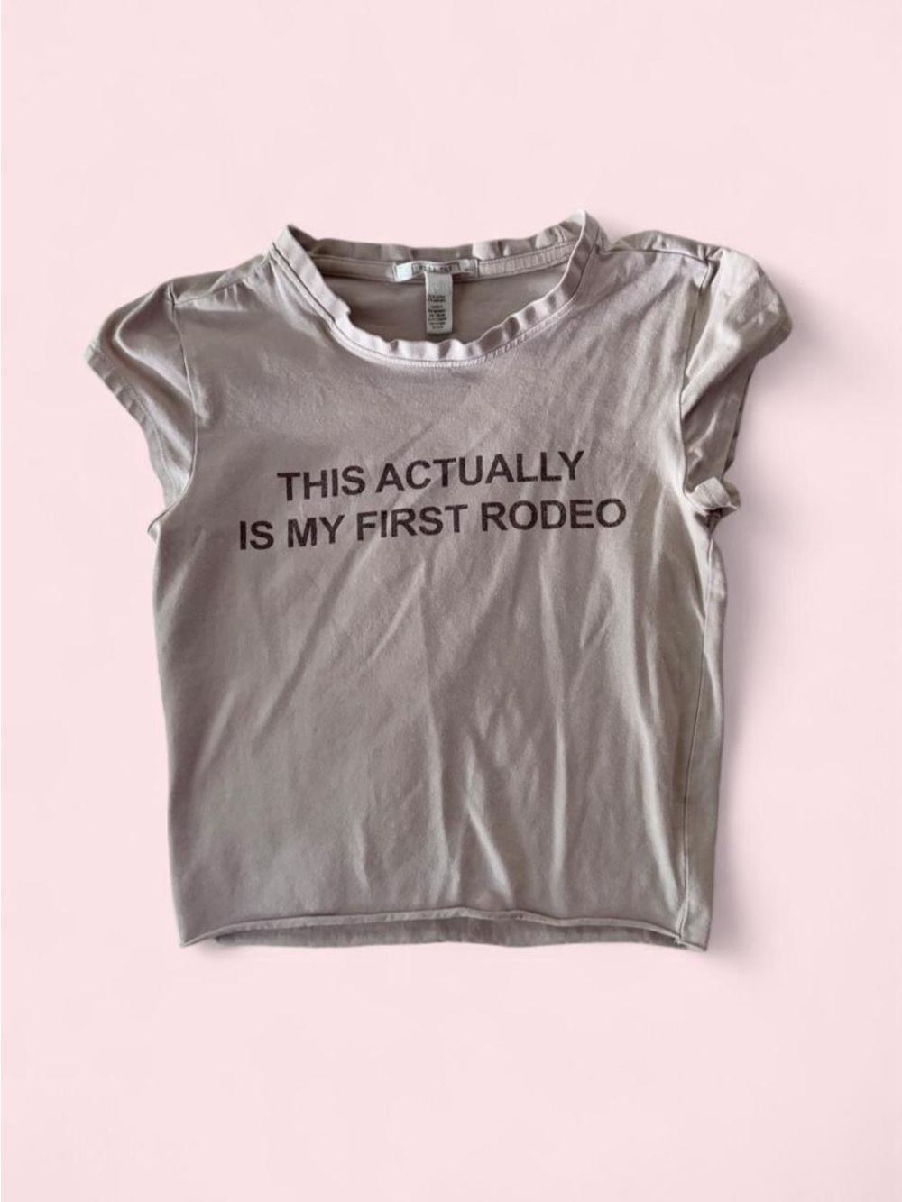 Full Tilt Taupe Graphic Crop Tee with 'This Actually Is My First Rodeo' Print
